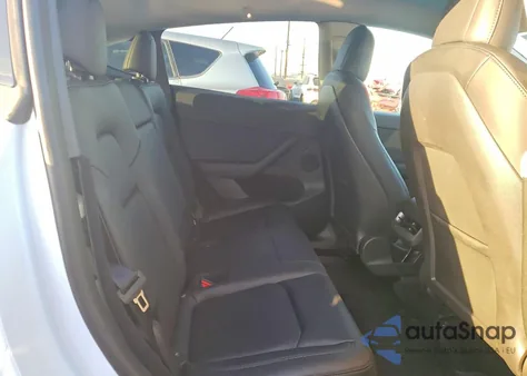 2023 Tesla Model Y from USA, damaged, VIN 7SAYGDEE7PF618909